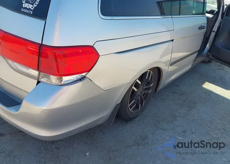 2010 Honda Odyssey Lx z USA, uszkodzony, nr VIN 5FNRL3H23AB025063